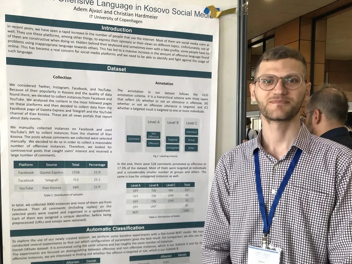 Adem Ajvazi on stage presenting A Dataset of Offensive Language in Kosovo Social Media at LREC 2022